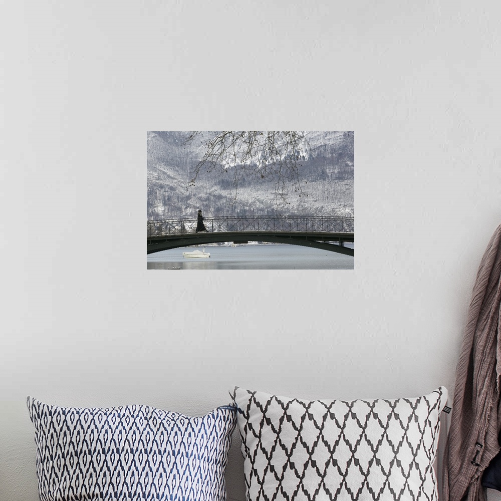 A bohemian room featuring Side profile of a person walking on a bridge, Lake Annecy, French Alps, France