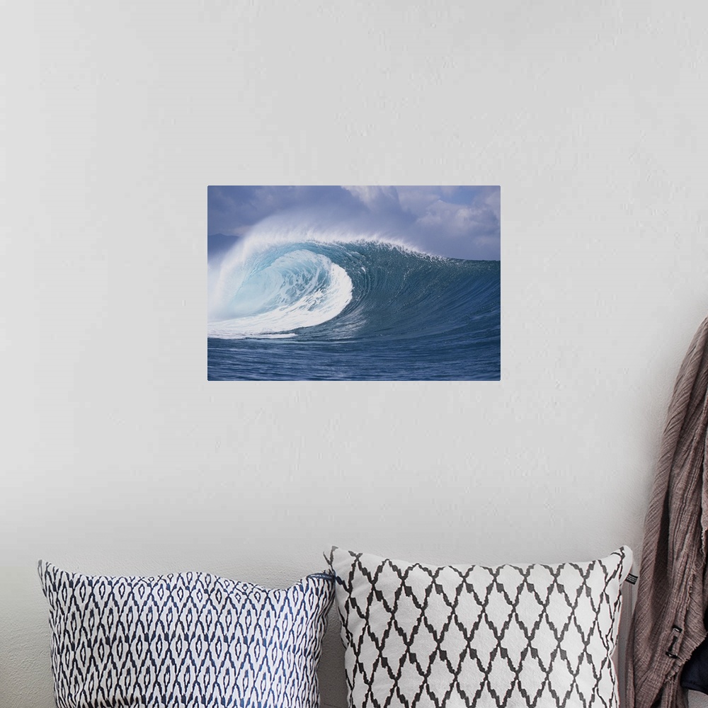 A bohemian room featuring Waves splashing in the sea