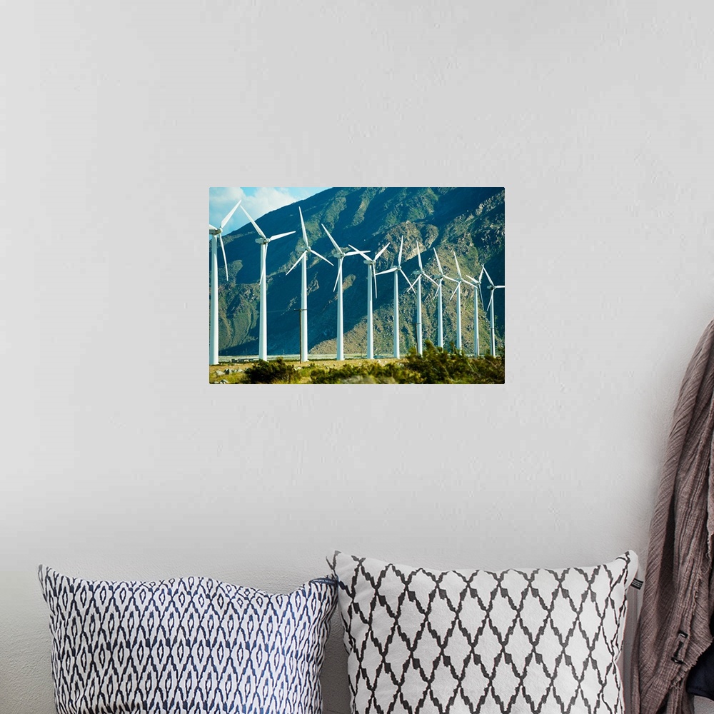 A bohemian room featuring Wind turbines in front of a mountain, Palm Springs, California