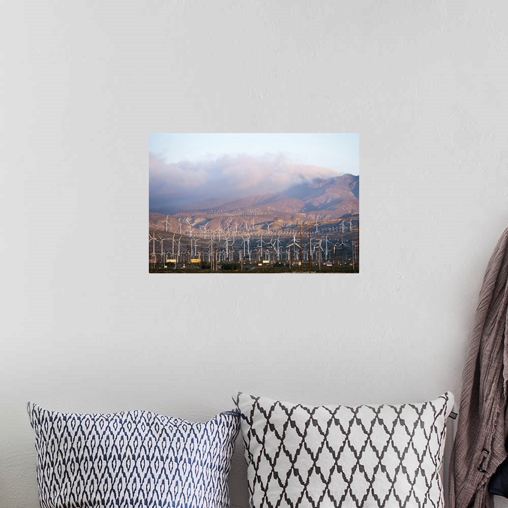 A bohemian room featuring Wind turbines with mountains in the background, Riverside County, California