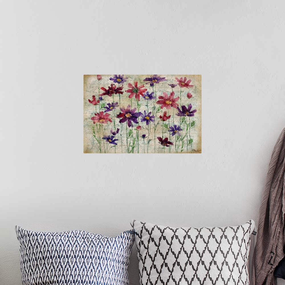 A bohemian room featuring Painting of daisies of varying colors on a textured background.