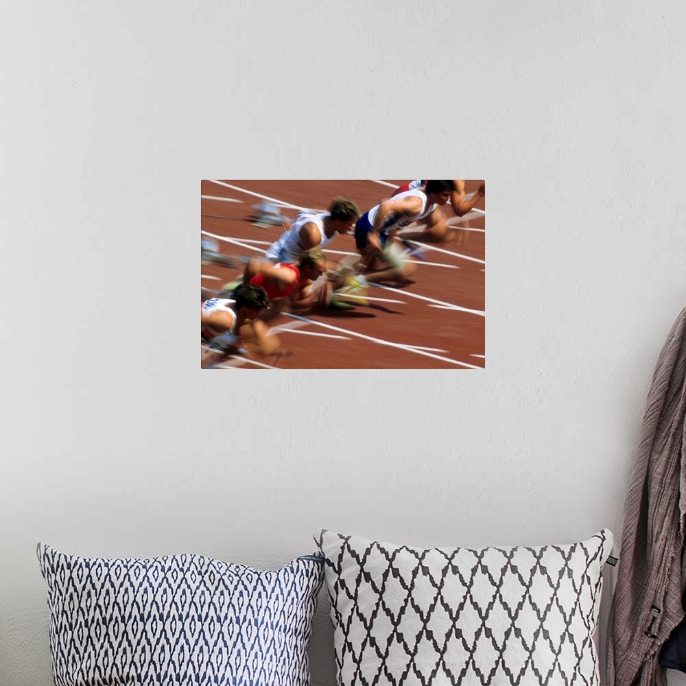 A bohemian room featuring Blurred action of men's 100 meter sprint race.