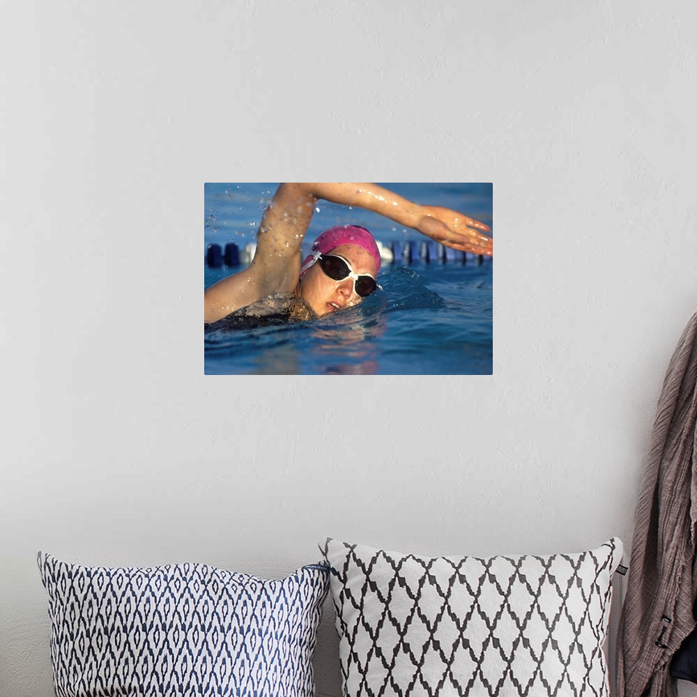 A bohemian room featuring Female swimmer in action