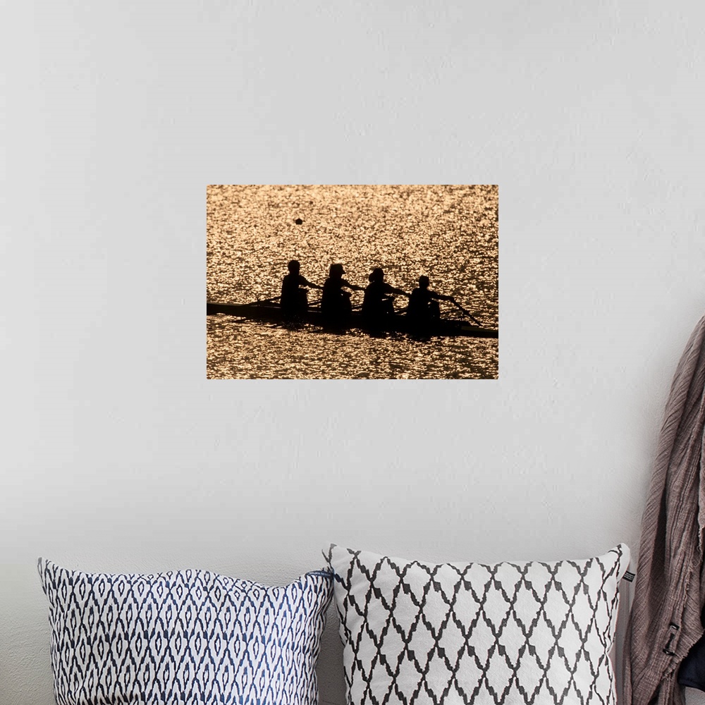 A bohemian room featuring Silhouette of women's fours rowing team