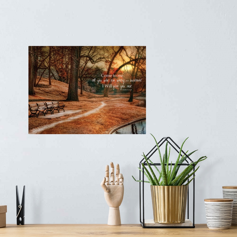 A bohemian room featuring A path through a park in autumn at sunset, with a bible verse.