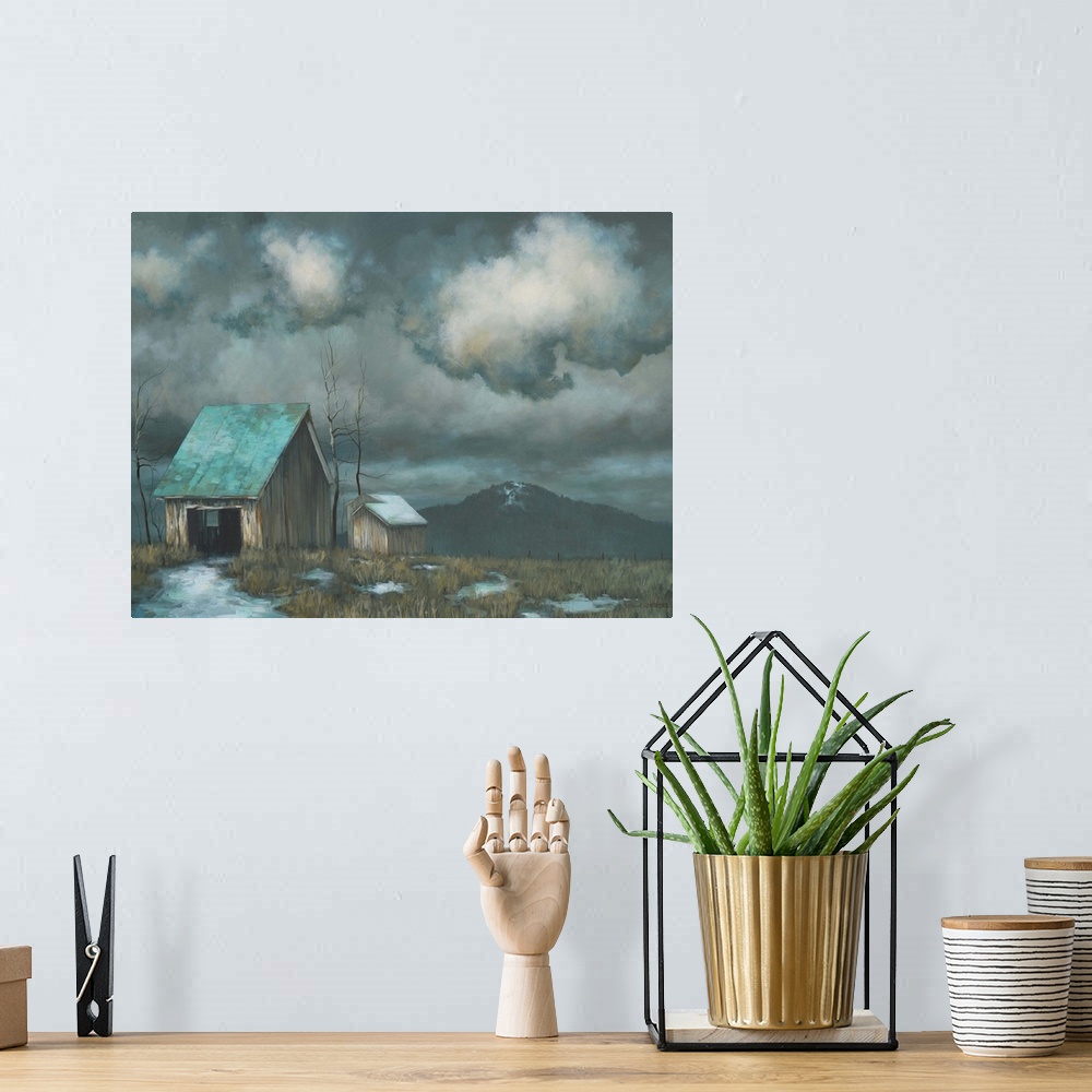 A bohemian room featuring Painting of a run-down farm house and shed under dark stormy clouds in a field.