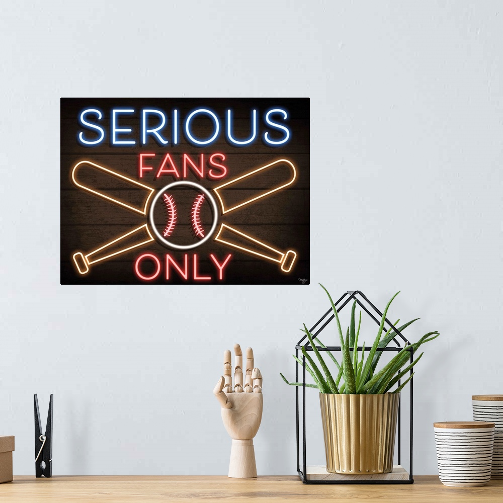 A bohemian room featuring Retro sign resembling neon lights which reads "Serious Fans Only."