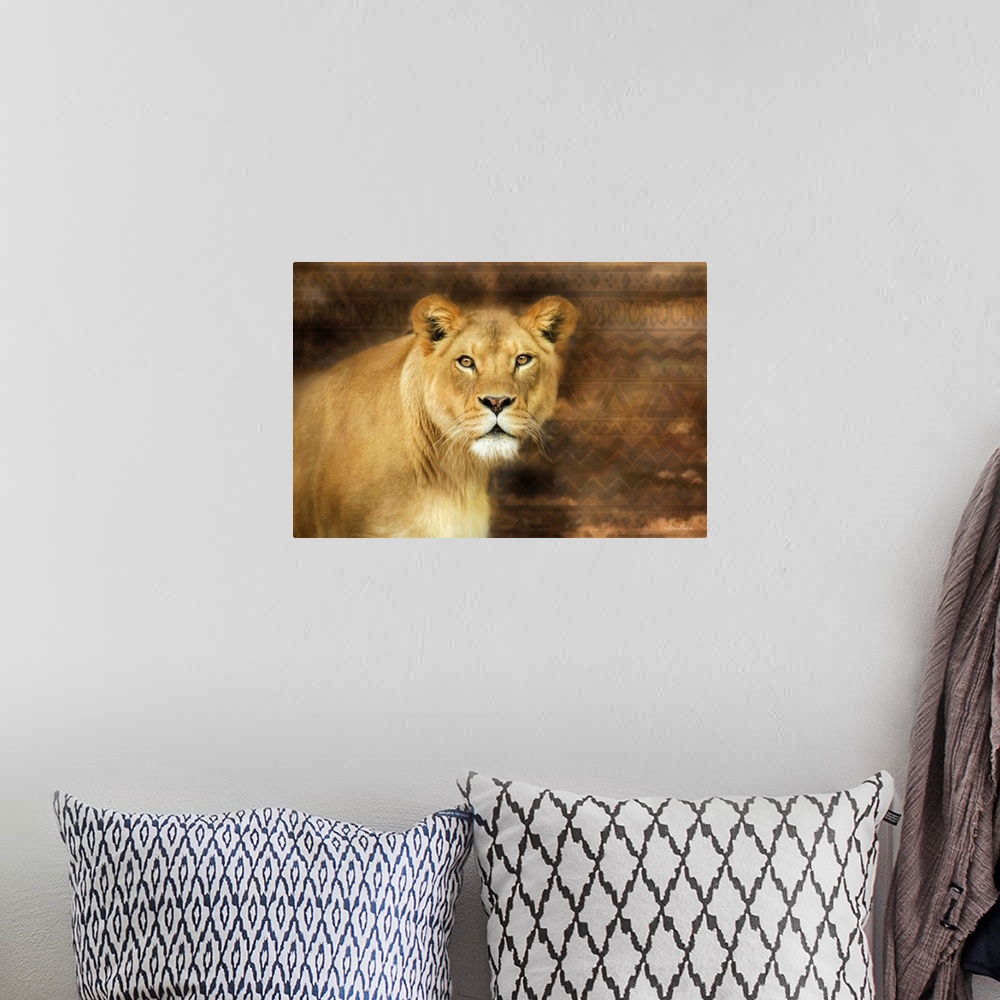 A bohemian room featuring Photograph of a lioness against a tribal patterned background.
