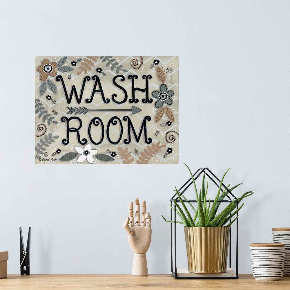 A bohemian room featuring A folk art style sign with flowers and leaves with "Wash Room" in a curly font.
