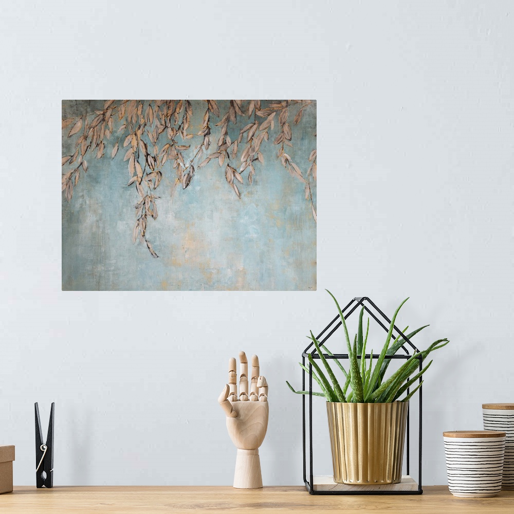 A bohemian room featuring Contemporary painting of a gold leaves hanging against a pale blue background.