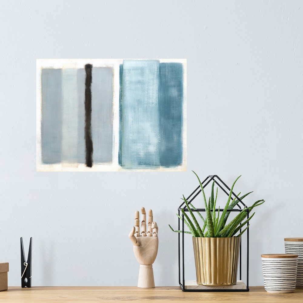 A bohemian room featuring Large abstract painting with rectangular sections of color in shades of blue and gray with one bl...
