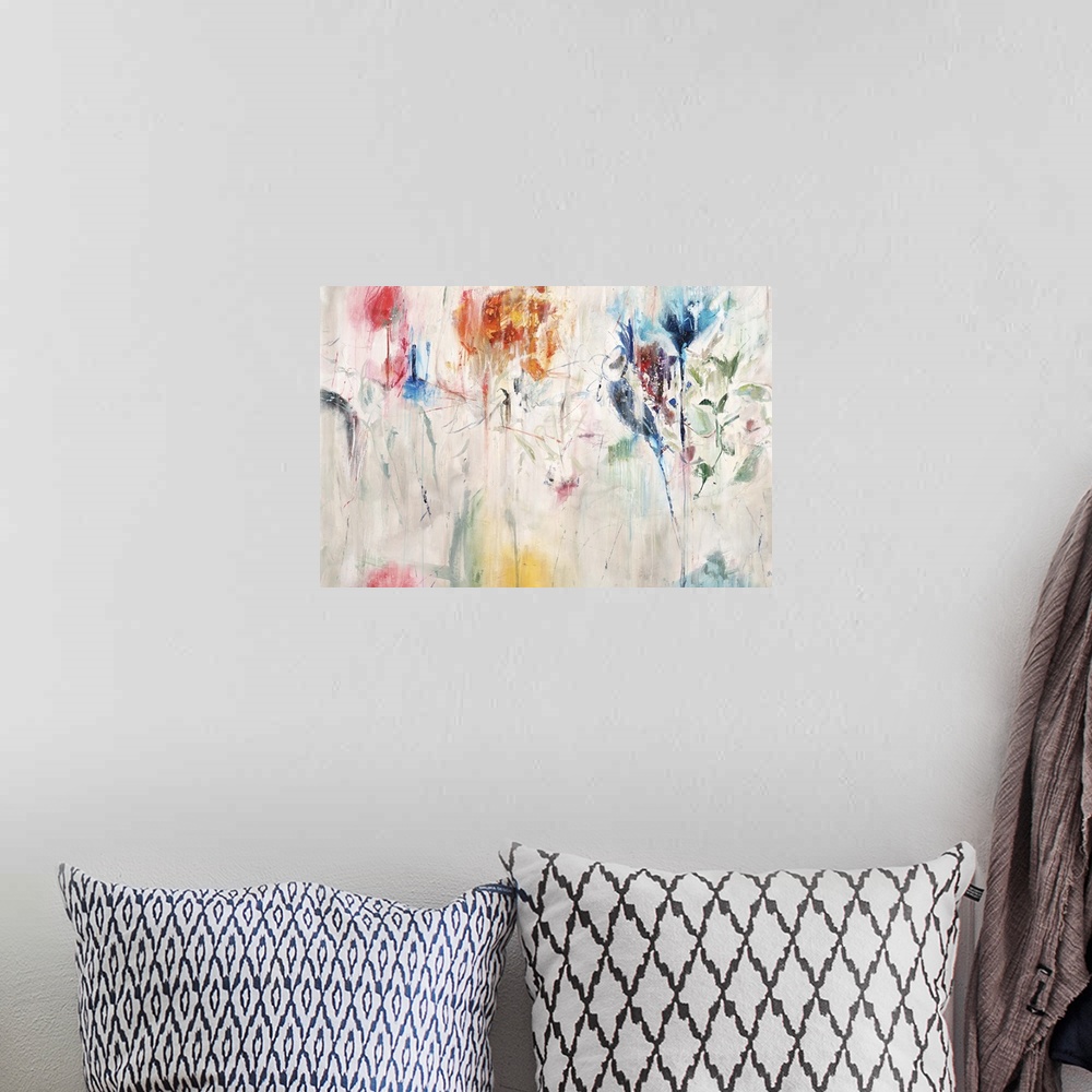 A bohemian room featuring Contemporary abstract painting of a colorful flowers against a neutral background.