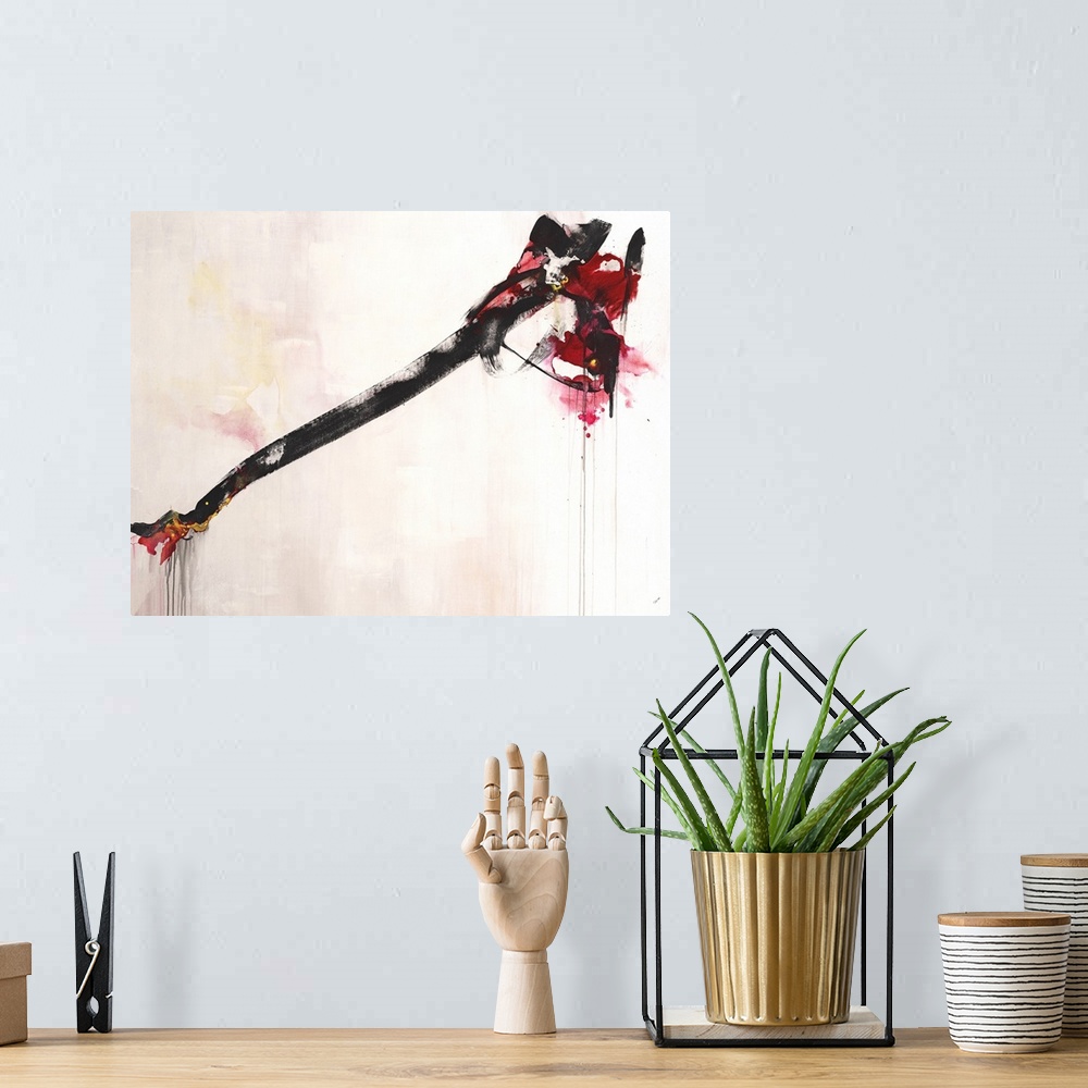 A bohemian room featuring Contemporary abstract painting using black and red organic forms against a neutral background.