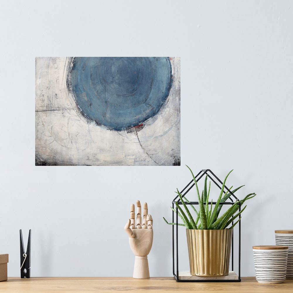 A bohemian room featuring Contemporary abstract painting of a large pale blue circle against a pale gray larger circular sh...