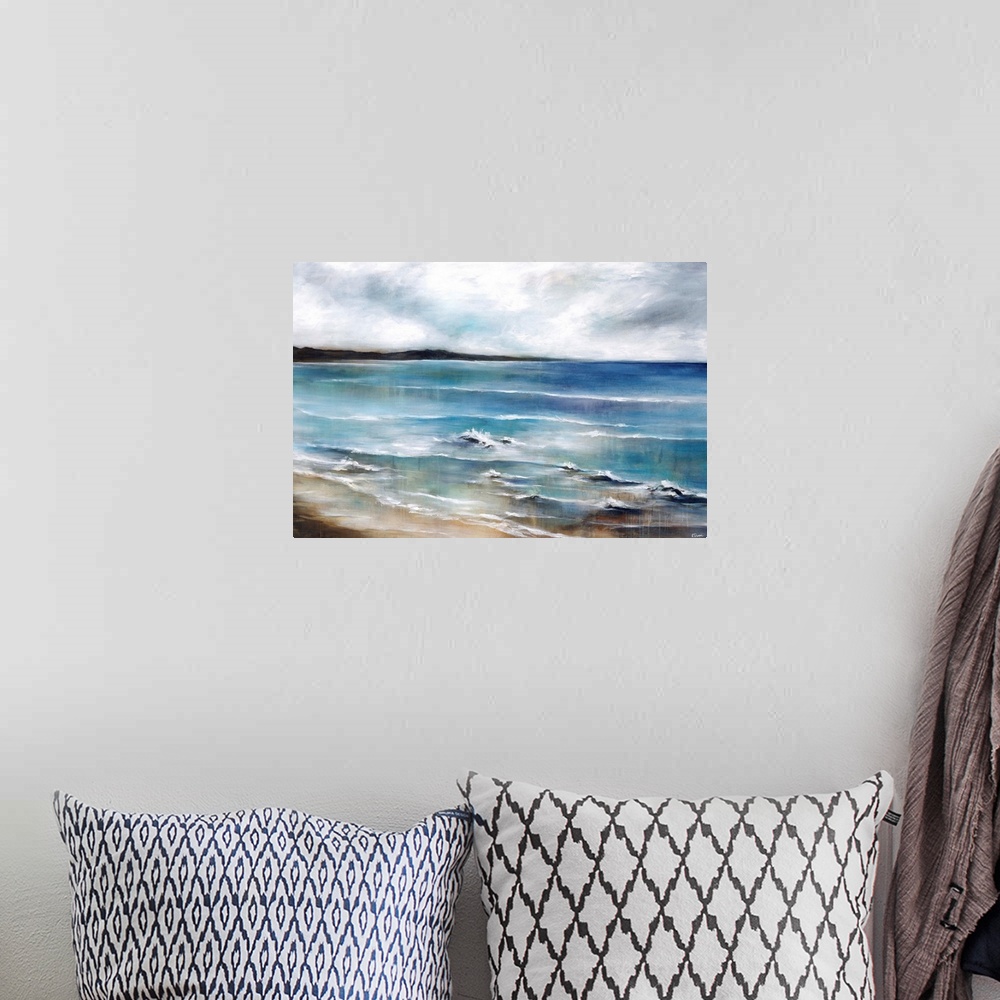 A bohemian room featuring Contemporary seascape painting of shallow waves on the beach.