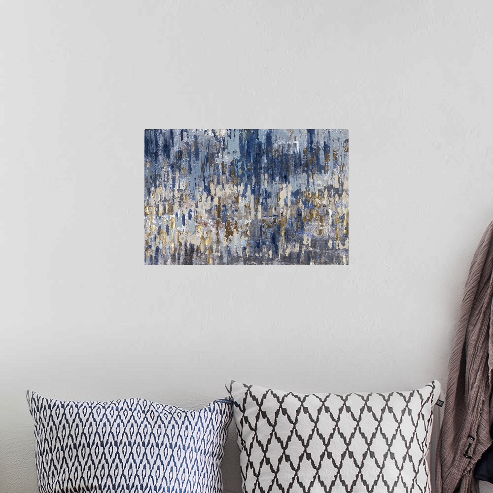 A bohemian room featuring A textured contemporary painting of blue and gold, giving the feeling of a distorted reflection.