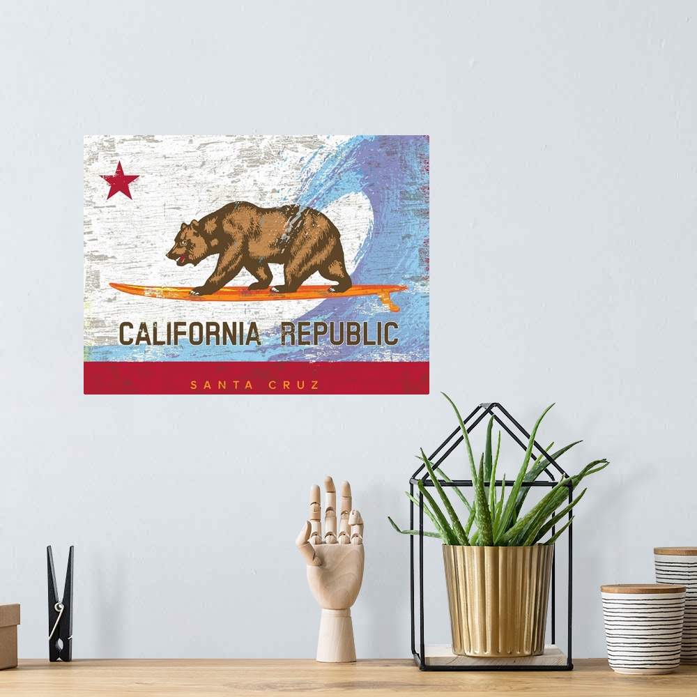 A bohemian room featuring Wall art of the California state bear flag with the bear surfing on a surfboard with wave behind ...