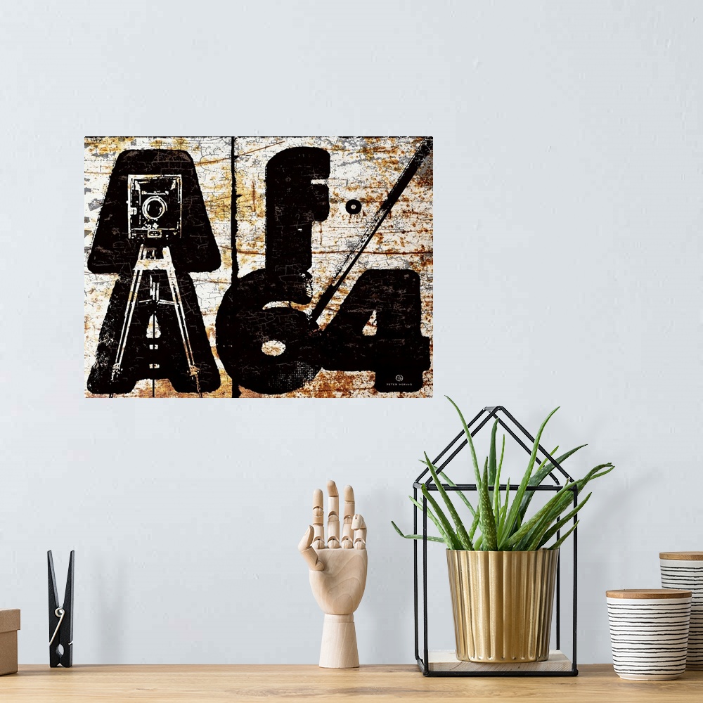 A bohemian room featuring f64 aperture chunky and bold typography with an illustrated 8x10 camera in the letters AA which s...