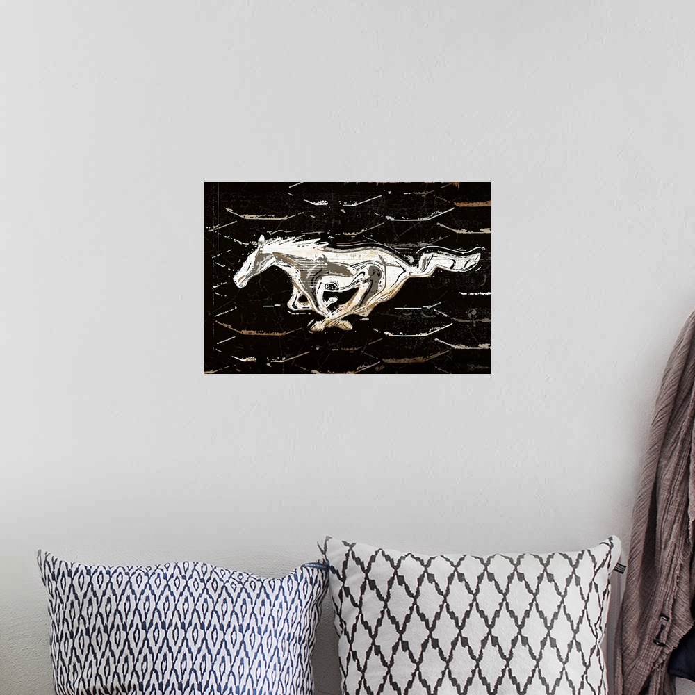 A bohemian room featuring A worn, distressed, cracked and rusty Ford running horse logo graphic.