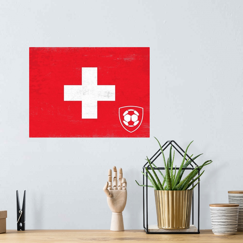 A bohemian room featuring Flag of Switzerland with soccer crest with soccer ball.