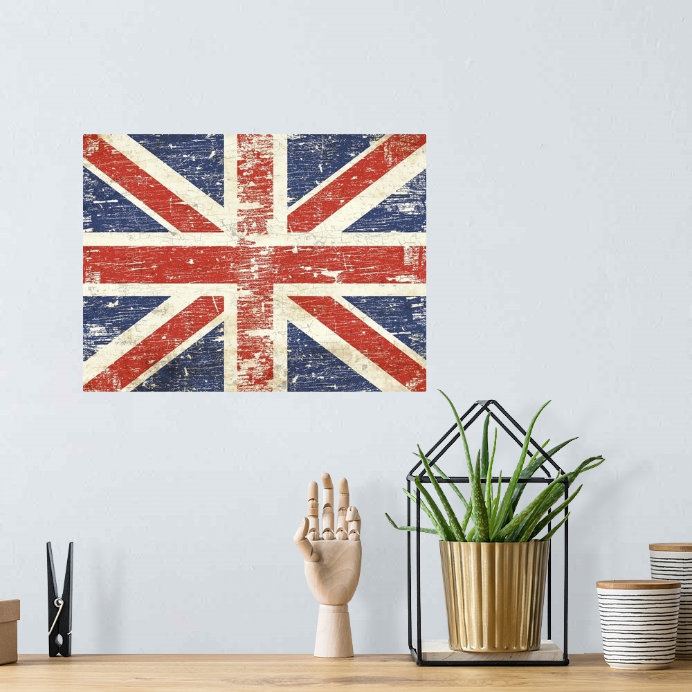 A bohemian room featuring Contemporary art of a worn and weathered looking Union Jack flag.