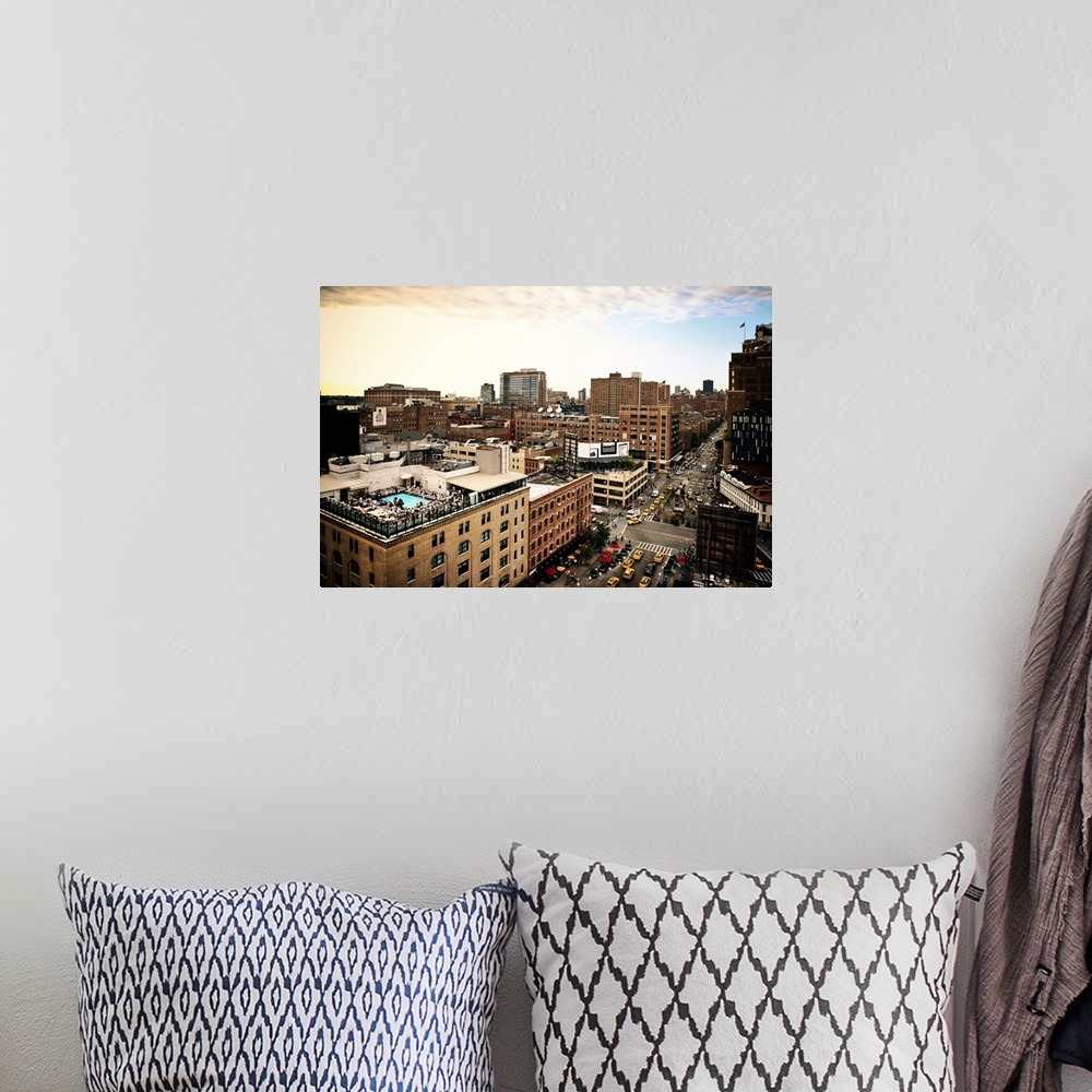 A bohemian room featuring Fine art photo of the New York City skyline, showing tall buildings and busy streets.