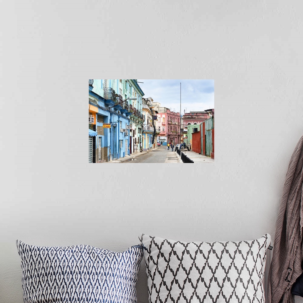 A bohemian room featuring Photograph of a streetscape in Havana, Cuba, highlighting the colorful architecture.