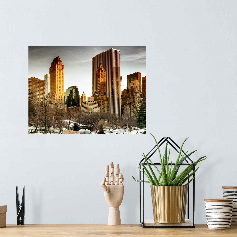 A bohemian room featuring A photograph of New York city at sunset from Central Park.