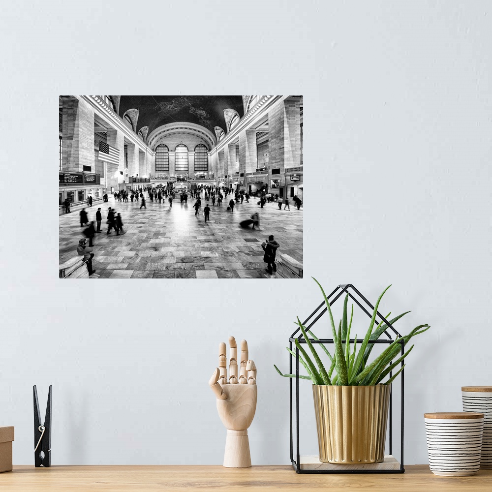 A bohemian room featuring A photograph of New York city's Grand Central Station.