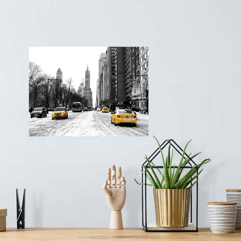 A bohemian room featuring A photograph looking down a road in New York city in winter.