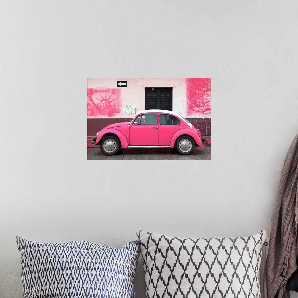 A bohemian room featuring Photograph of a pink Volkswagen Beetle parked in front of a wall covered in pink American graffit...