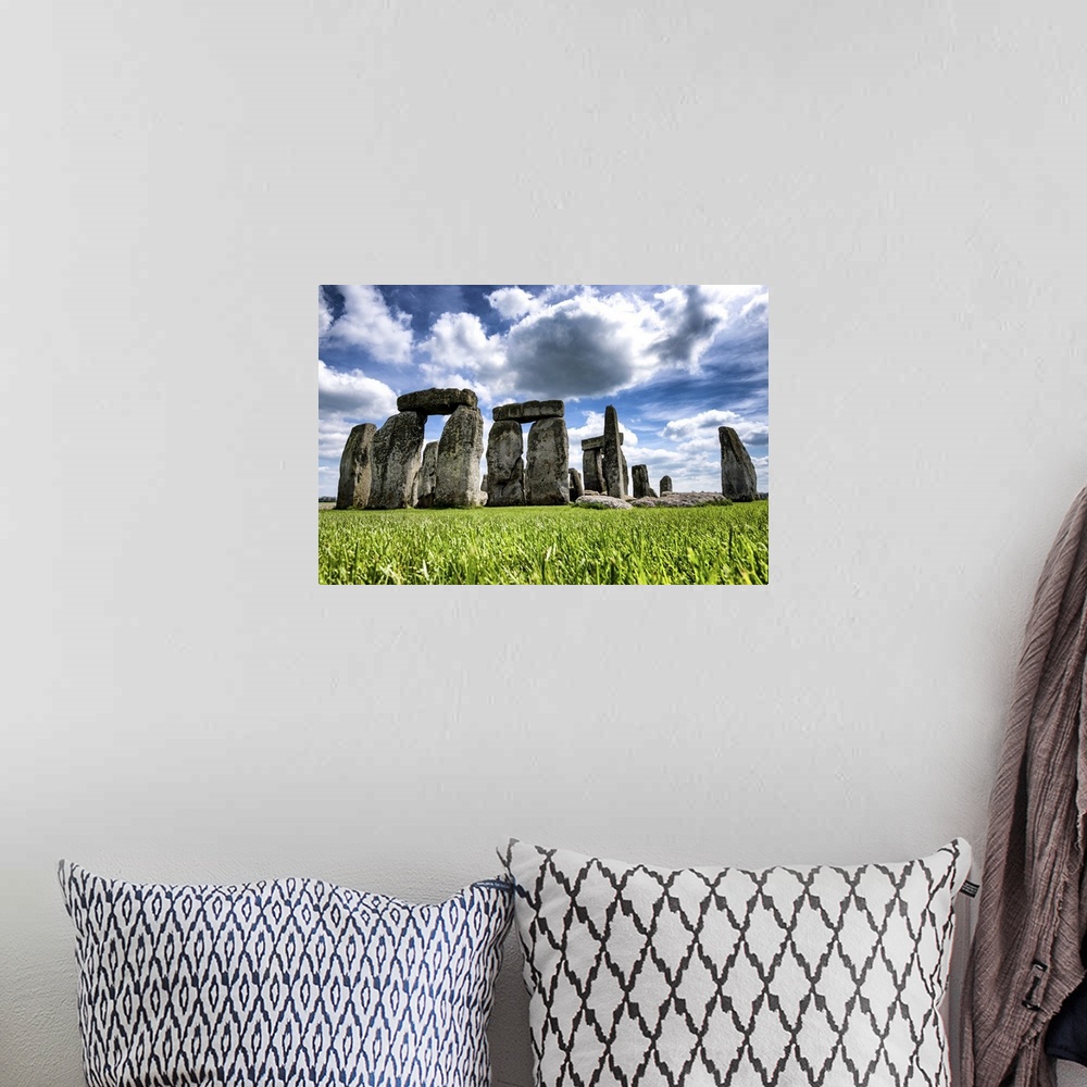 A bohemian room featuring Fine art photograph of the prehistoric monument of Stonehenge.
