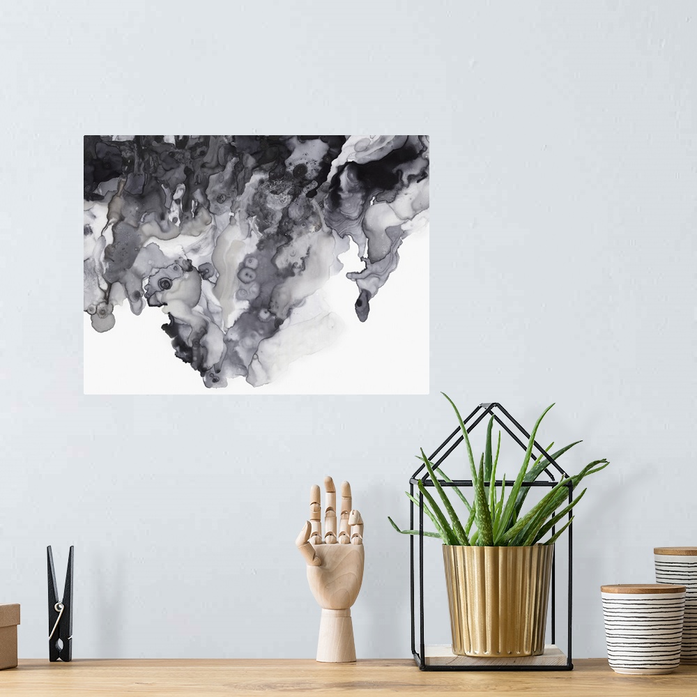 A bohemian room featuring Abstract artwork with different textured shades of gray on a white background.