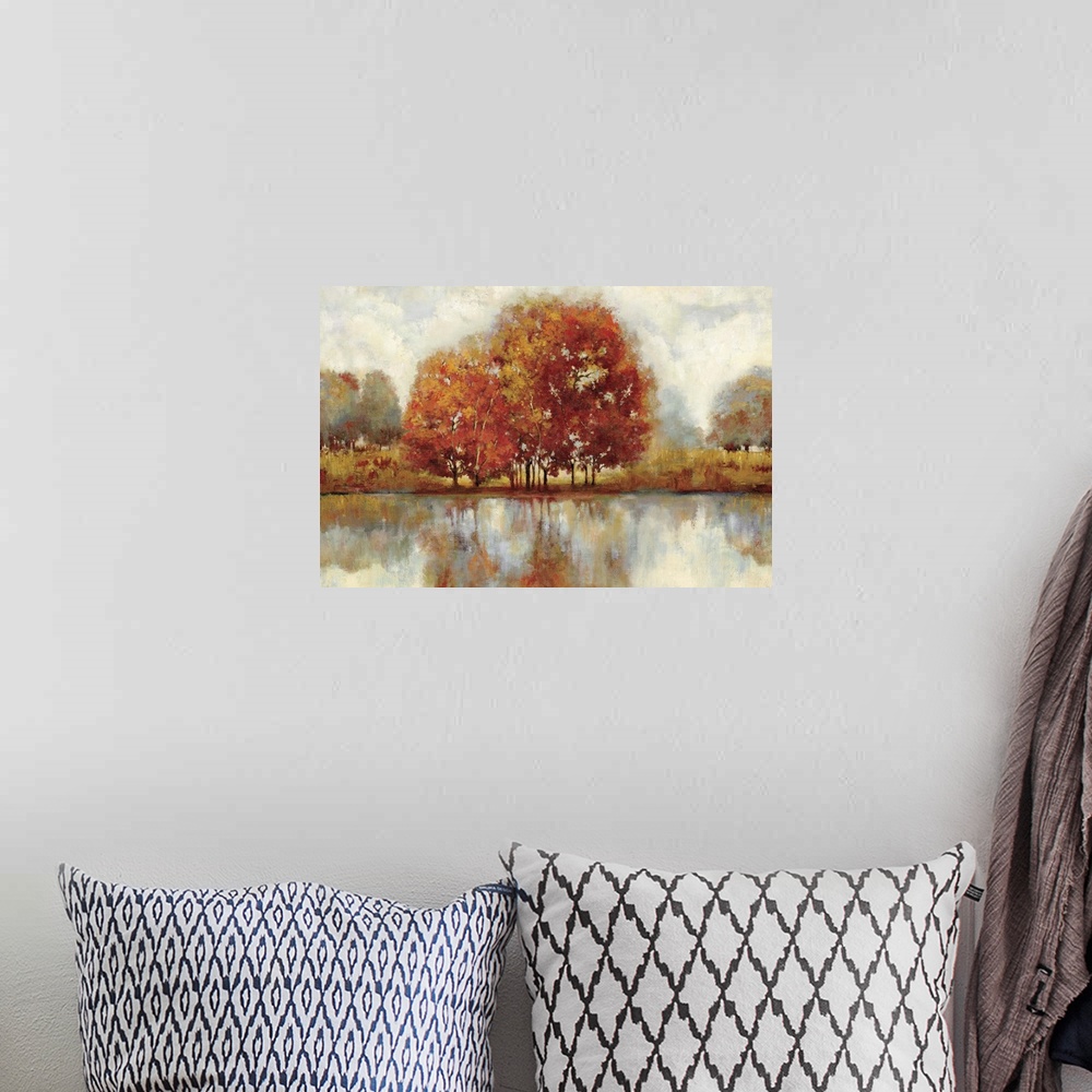 A bohemian room featuring Contemporary painting of a countryside forest scene in autumn foliage.