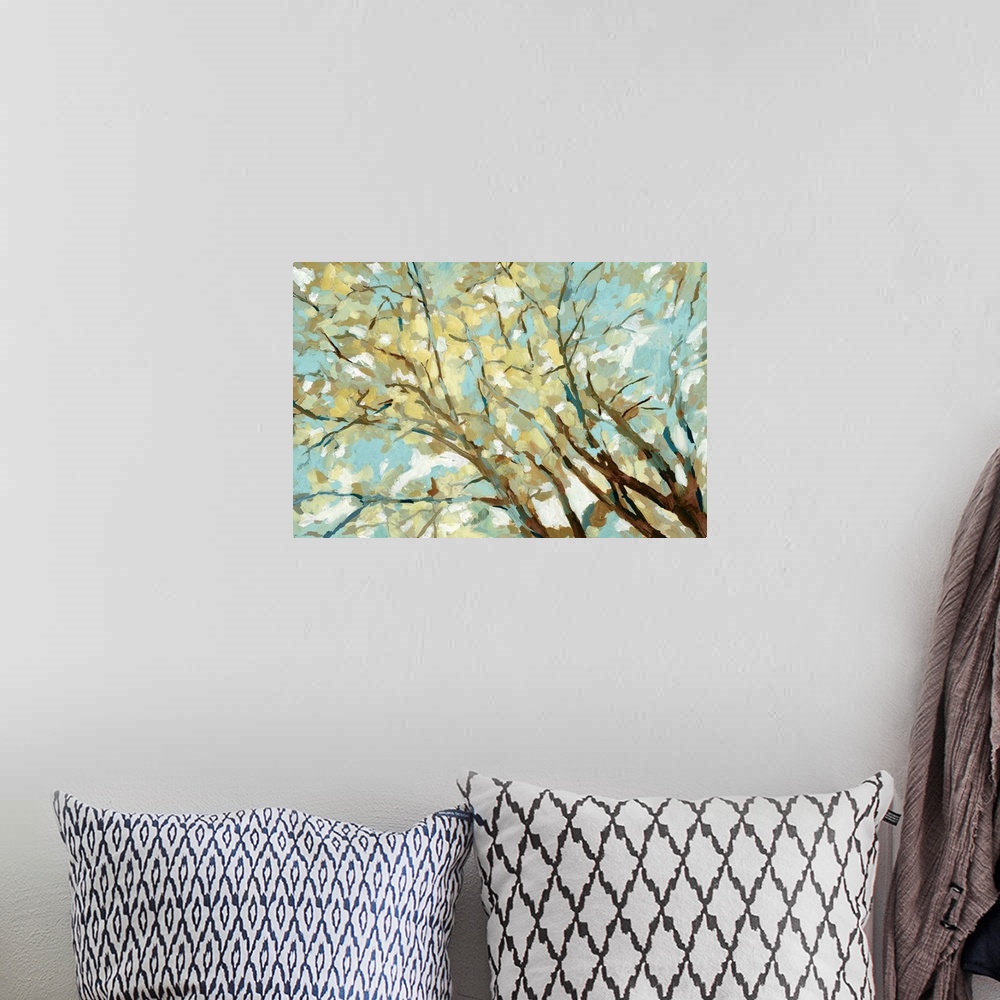 A bohemian room featuring Contemporary painting of branches with yellow and blue leaves.