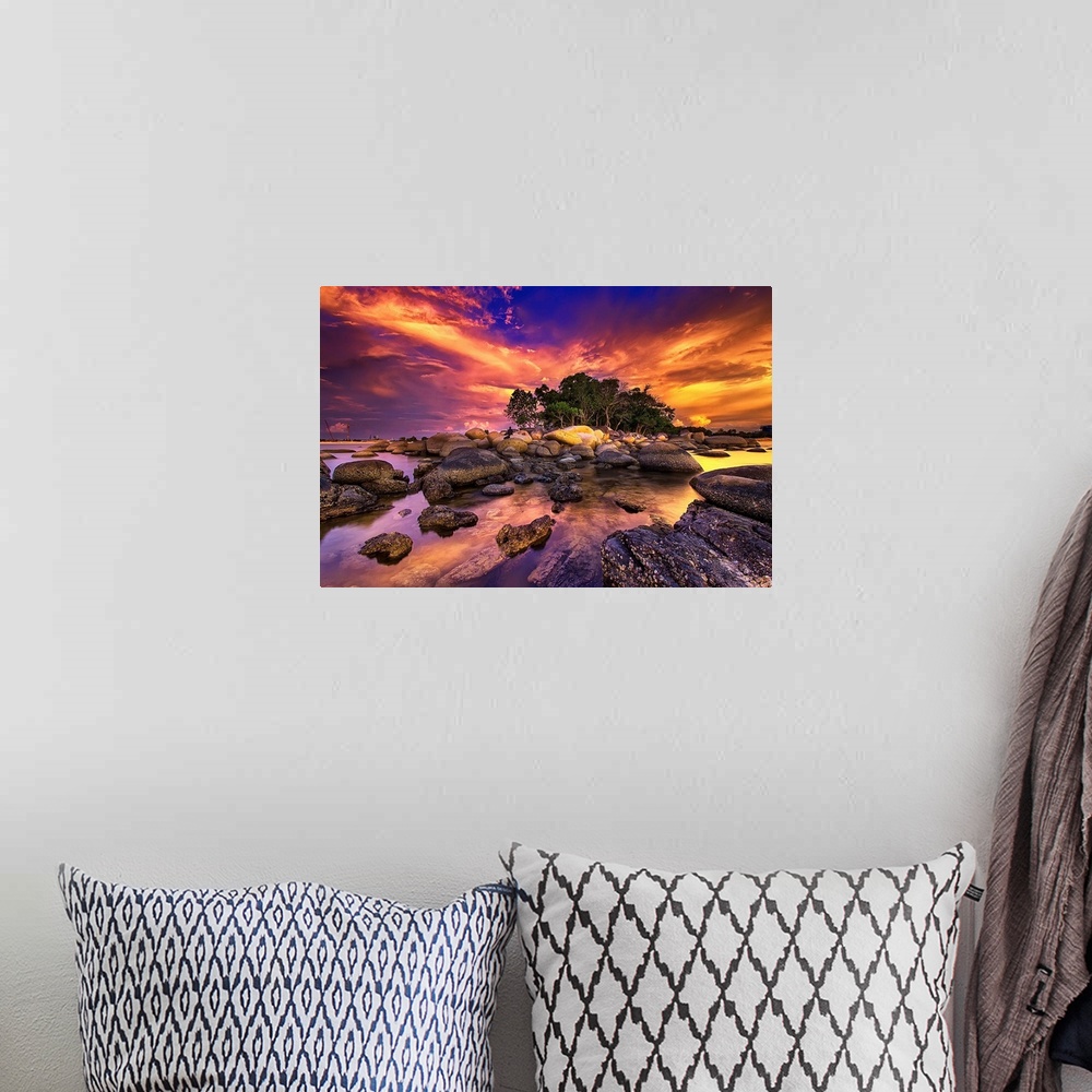 A bohemian room featuring Photograph of sunset sky lit up in a blaze of sunlight.