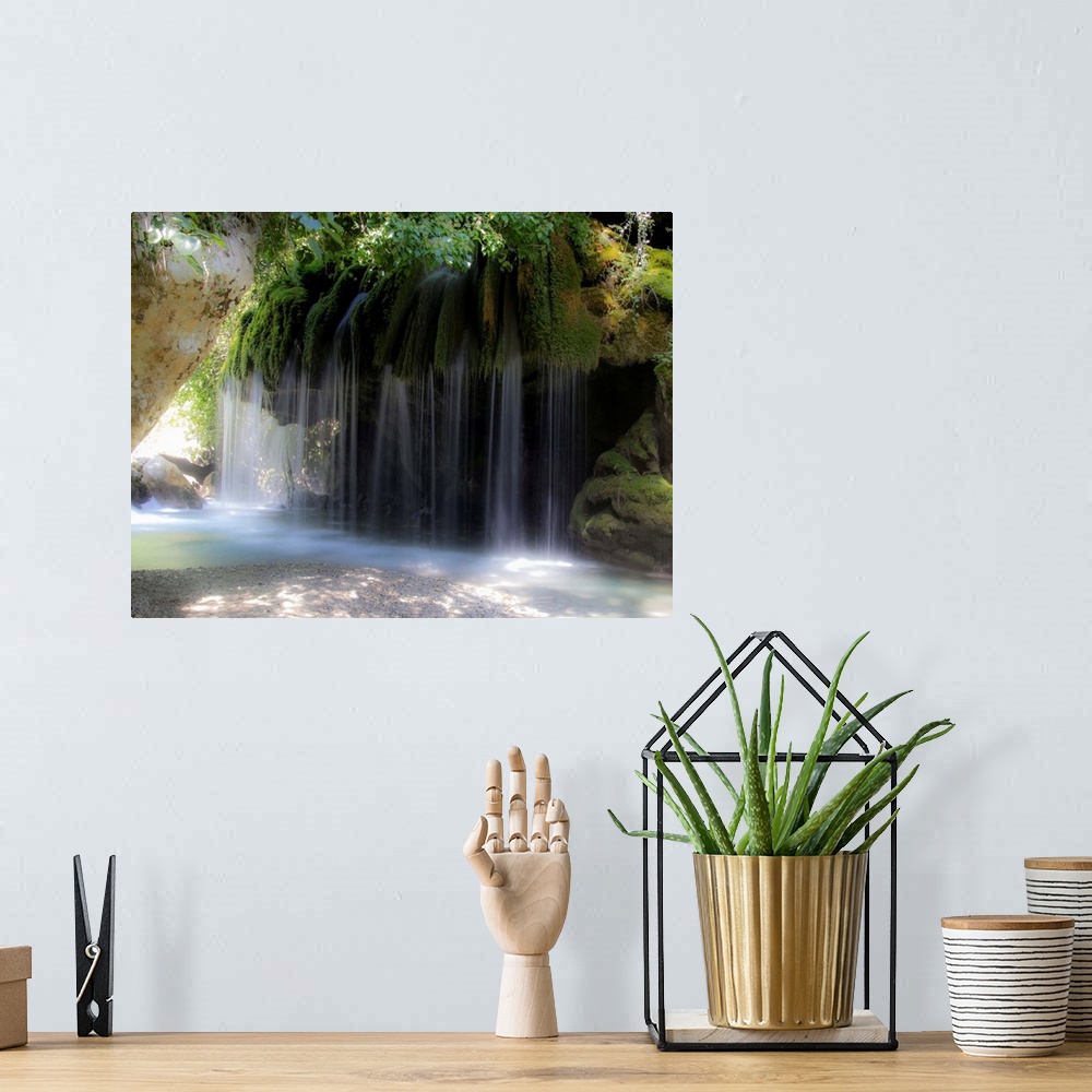 A bohemian room featuring Waterfalls in Casaletto Spartano, over the Bussento River, Italy.