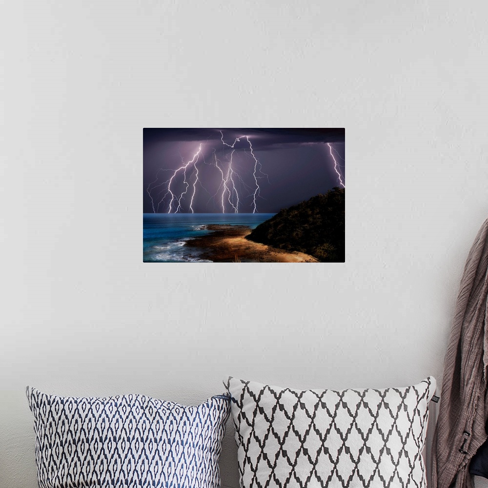 A bohemian room featuring Lightning strikes over the sea, Great Ocean Road, Victoria, Australia.