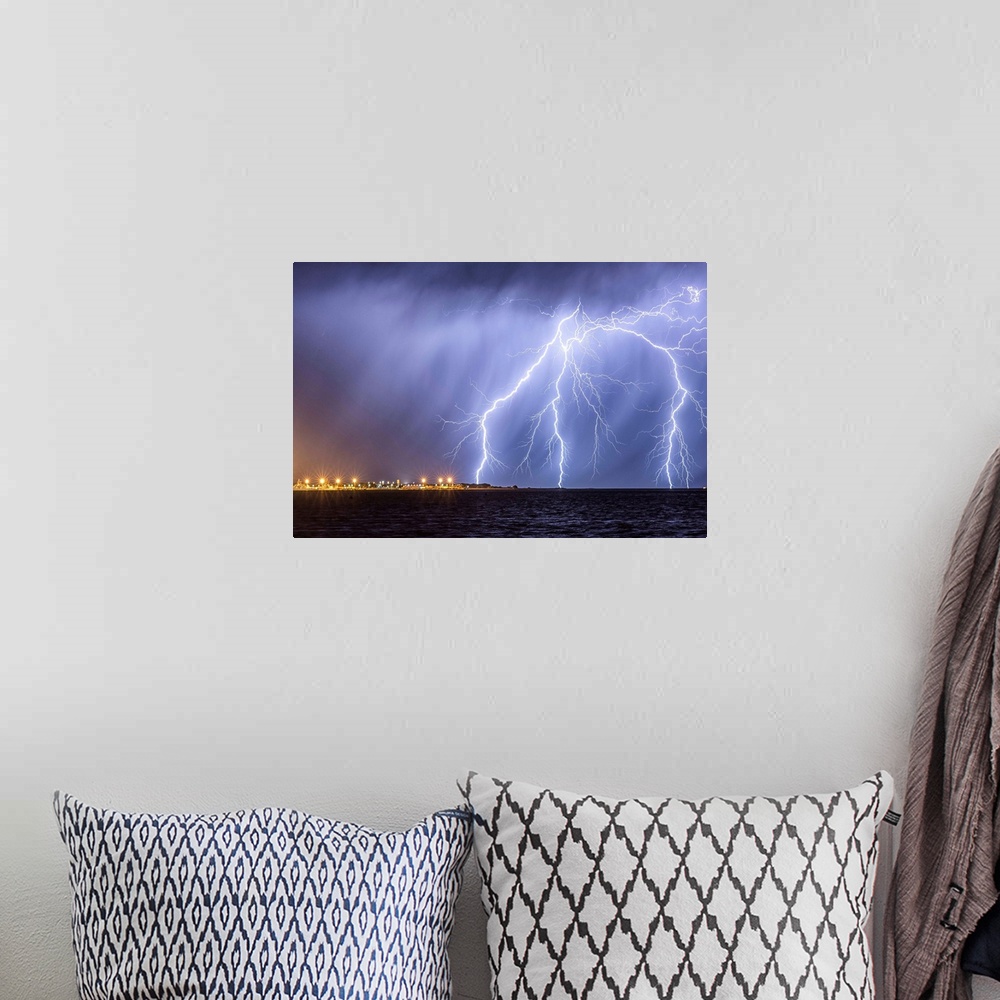 A bohemian room featuring Lightning storm over Garden Island Navel Base, Rockingham, Australia.