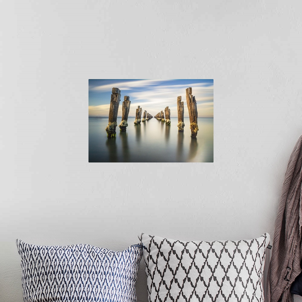 A bohemian room featuring Clifton Springs Pier at sunset, Victoria, Australia.
