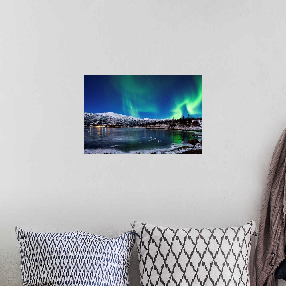 A bohemian room featuring Aurora Borealis over Lodingen, Norway.
