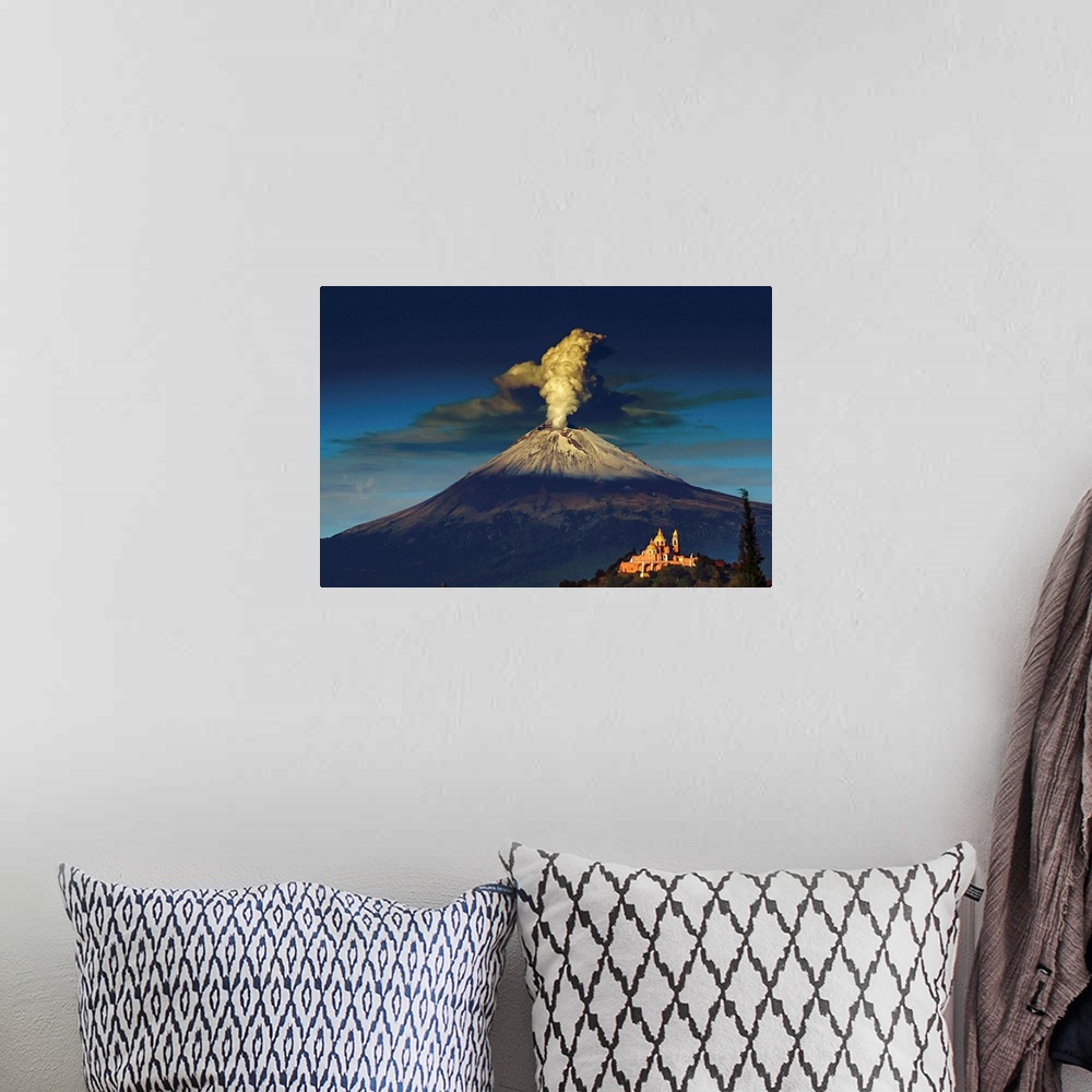 A bohemian room featuring Smoking Popocatepetl volcano in Mexico in the dawn light.