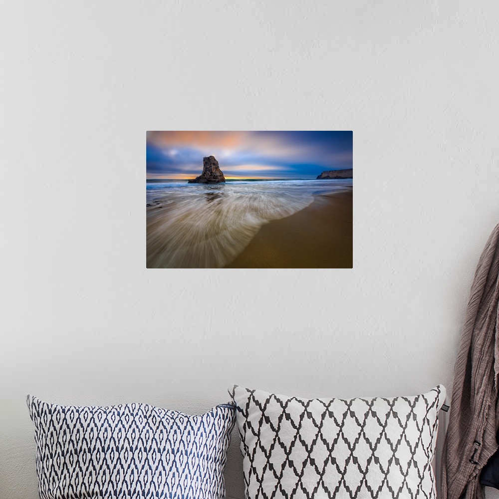 A bohemian room featuring Sea stack in the ocean on the Santa Cruz beach, California, at sunset.