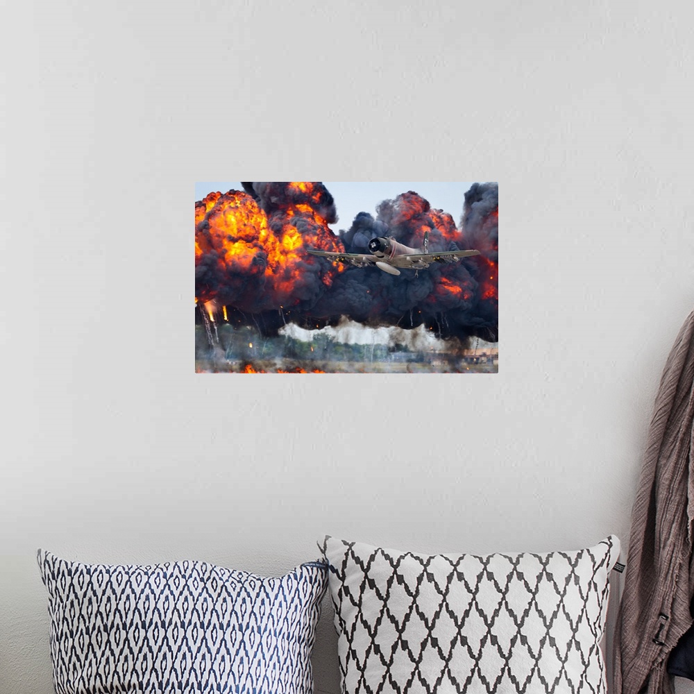 A bohemian room featuring A military plane flies away from large fiery smoke clouds created by explosions.
