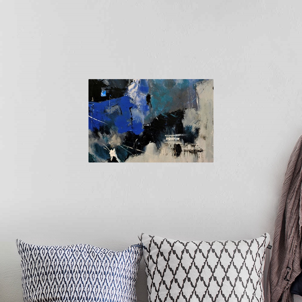 A bohemian room featuring Abstract painting in shades of  blue, gray and white mixed in with black contrasting designs.