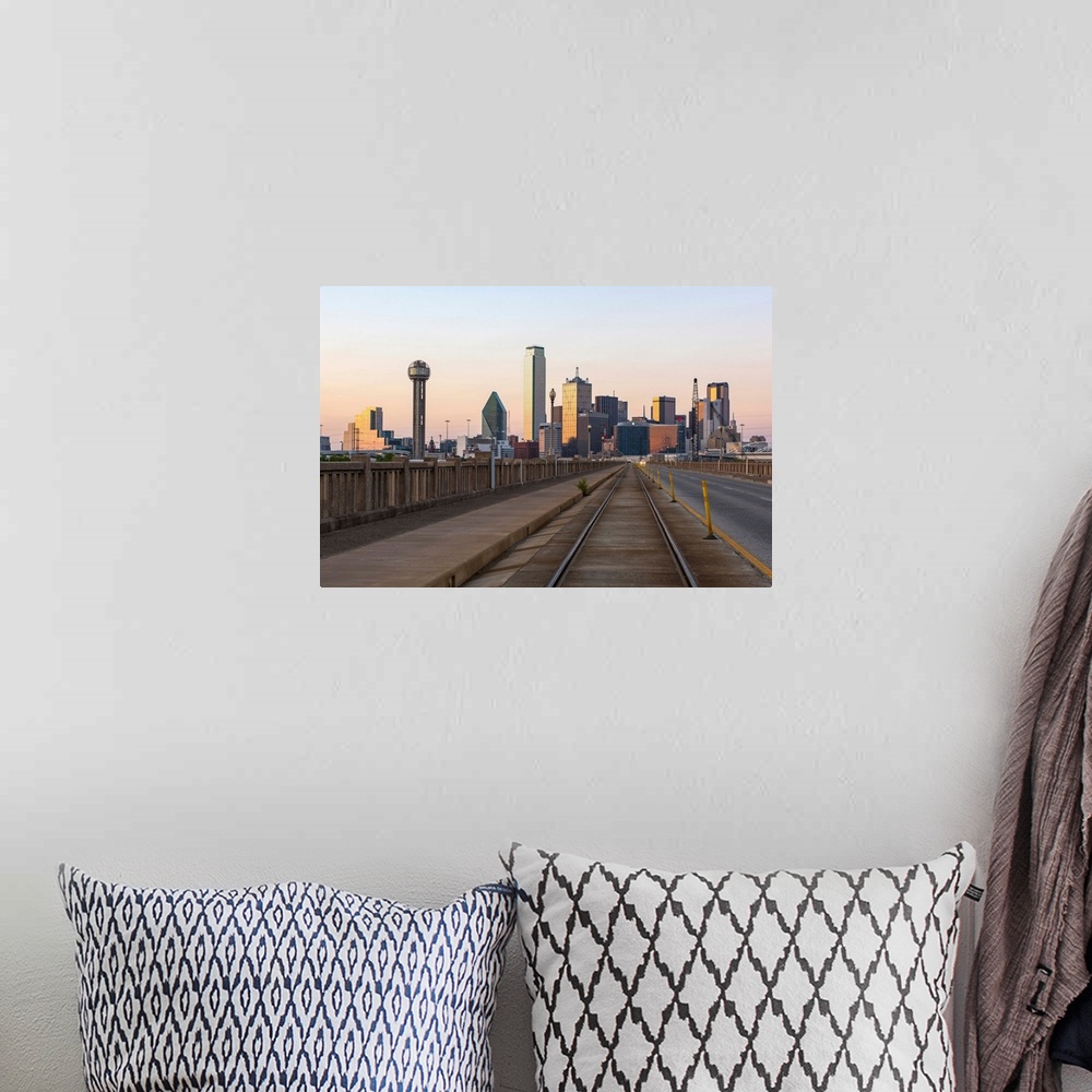 A bohemian room featuring The city of Dallas, Texas at sunset.