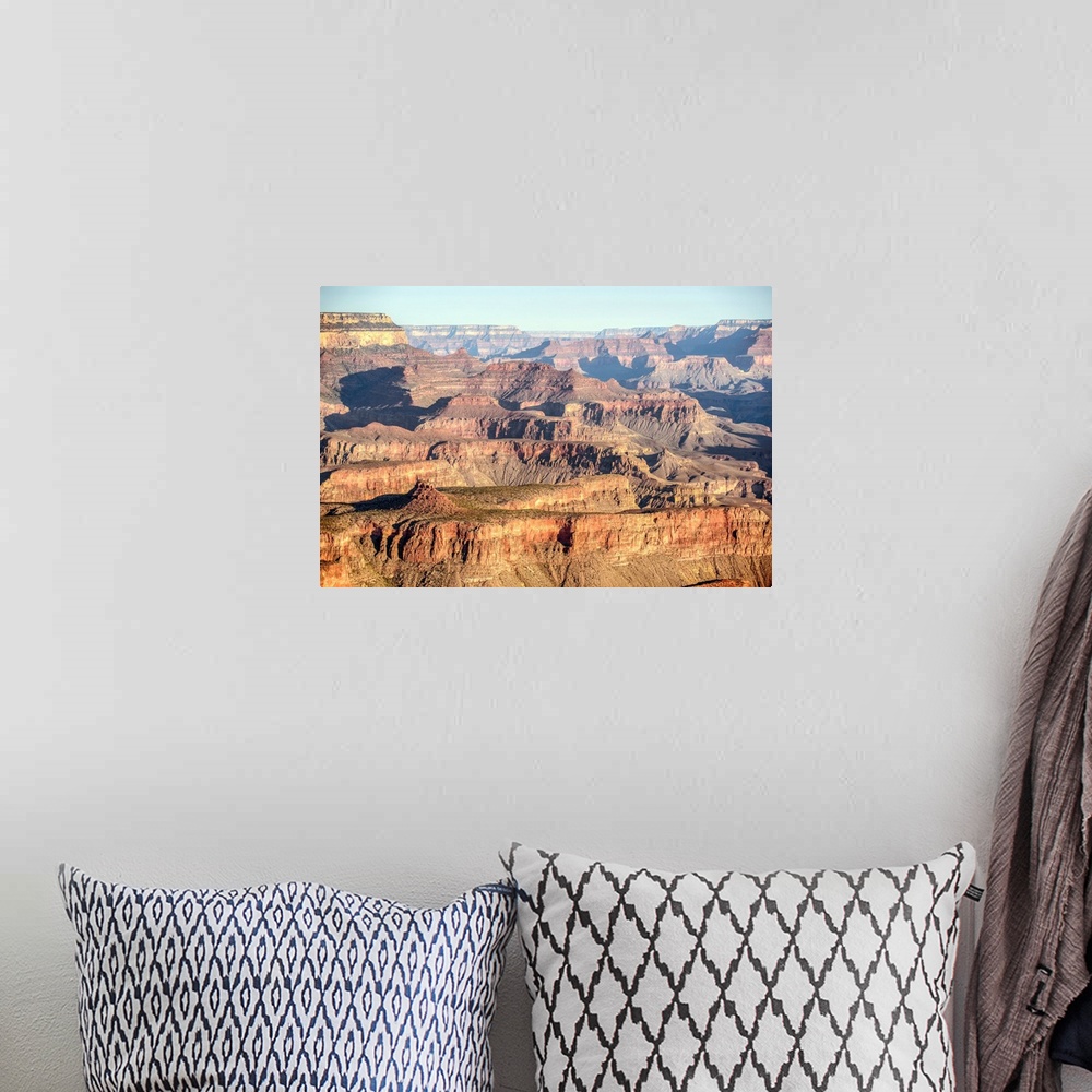A bohemian room featuring Elevated view of geological formations at sunrise in Grand Canyon National Park, Arizona.