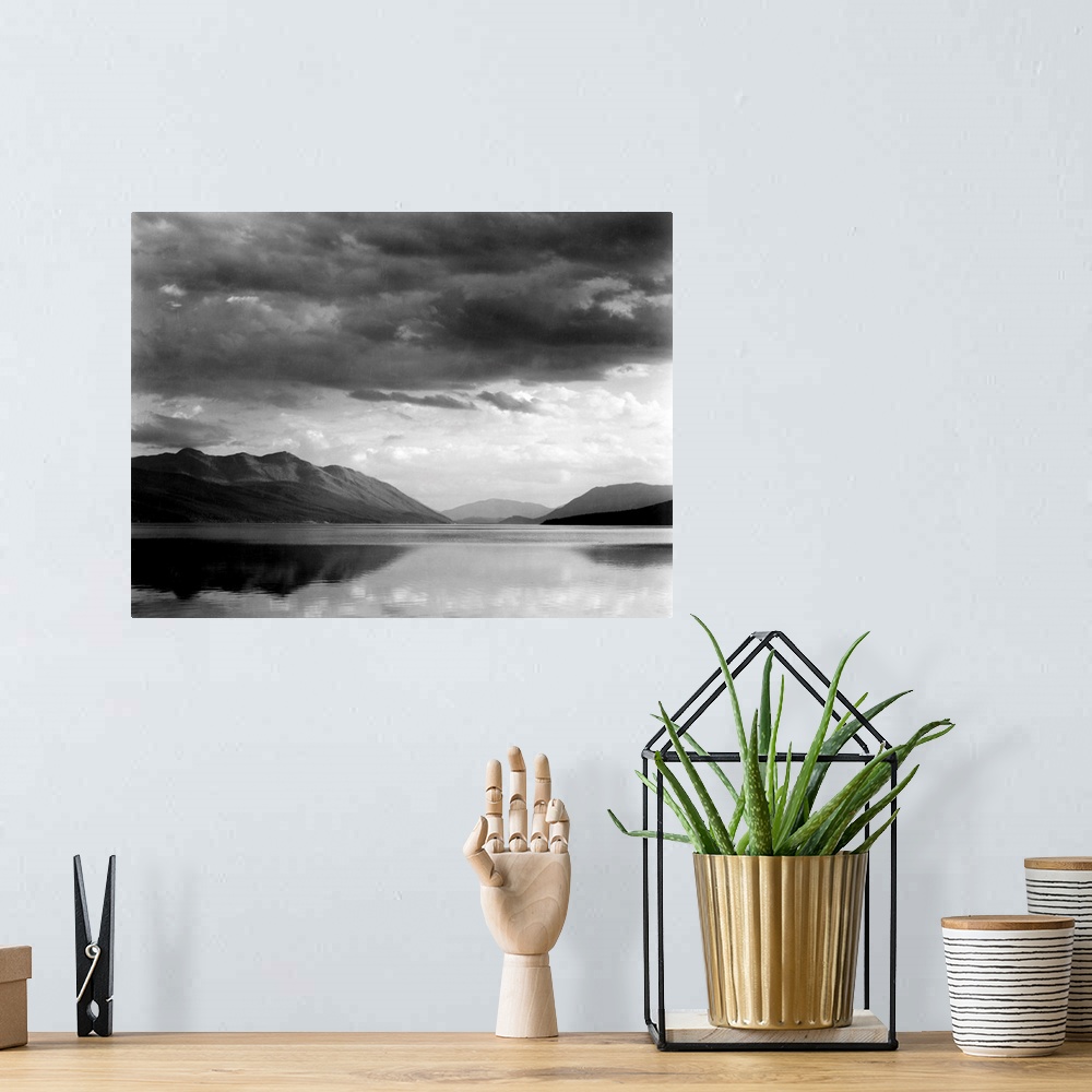 A bohemian room featuring Evening, McDonald Lake, Glacier National Park, looking across lake to mountains and clouds.