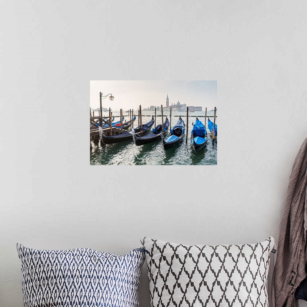 A bohemian room featuring Photograph of gondolas lined up in a row with St. Mark's Square (Piazza San Marco) in the backgro...