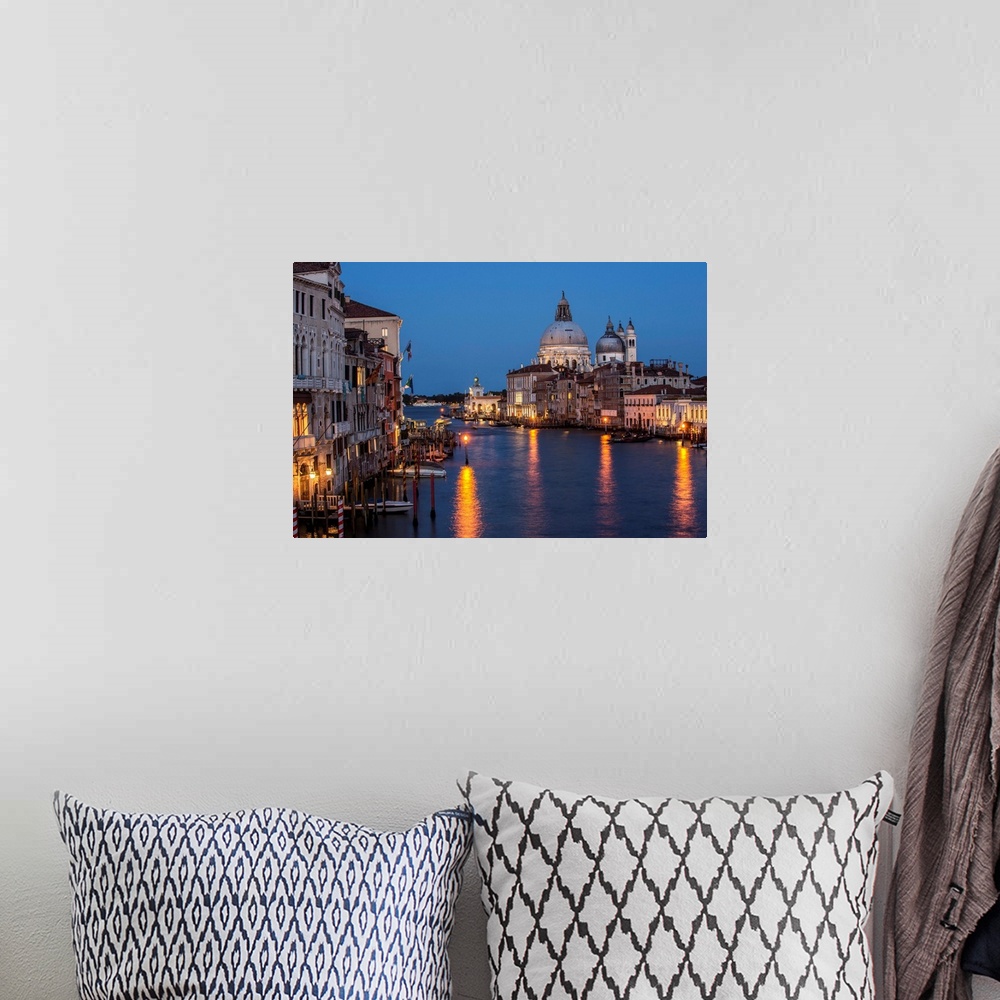 A bohemian room featuring Photograph of Grand Canal lit up at night with the Santa Maria della Salute in the background.